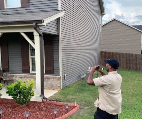 fayetteville nc home inspector inspecting home exterior